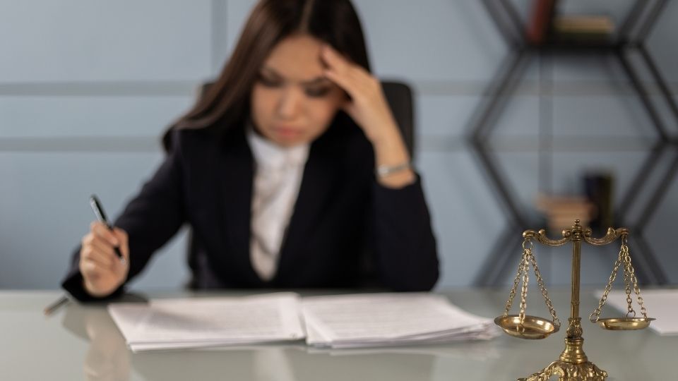 (In the image it can be seen that the solicitor is checking how strong the civil litigation case is) Do I Have a Strong Civil Litigation Case