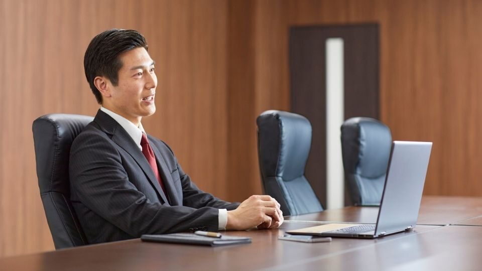 (In the image a solicitor can be seen participating in a remote hearing)