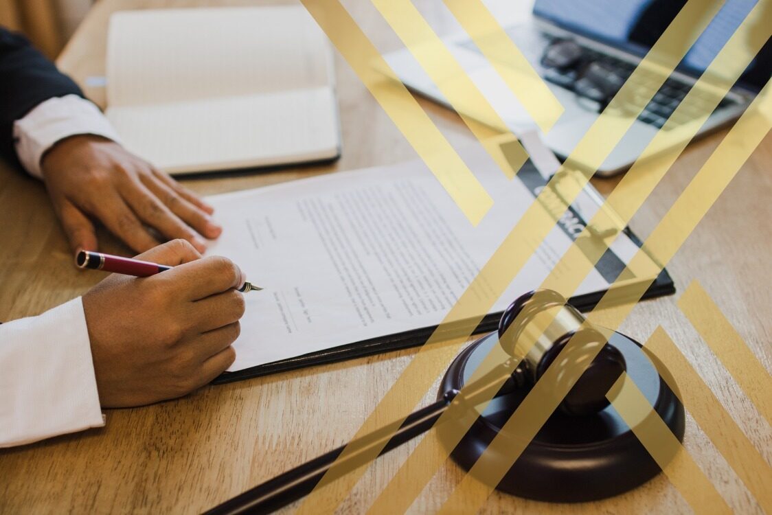 (The image shows a solicitor is writing a legal Letter)