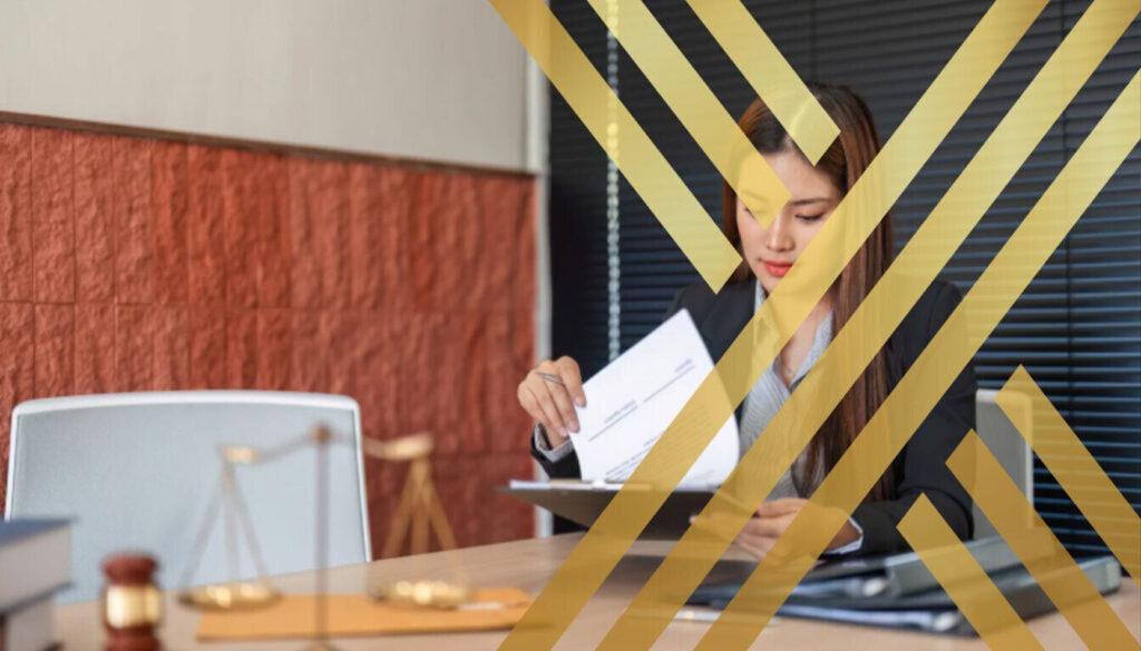 A UK immigration specialist reviewing documents for a student's Further Leave to Remain application