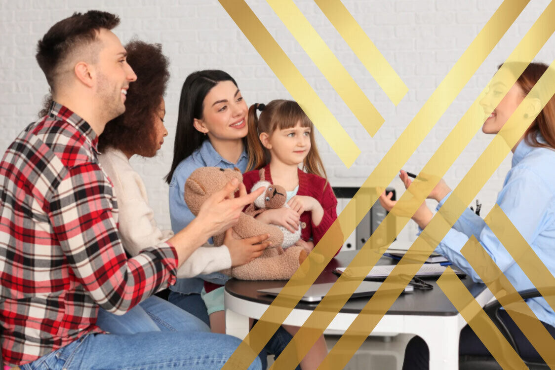 Prospective adoptive family meeting with an agency during the UK adoption process.