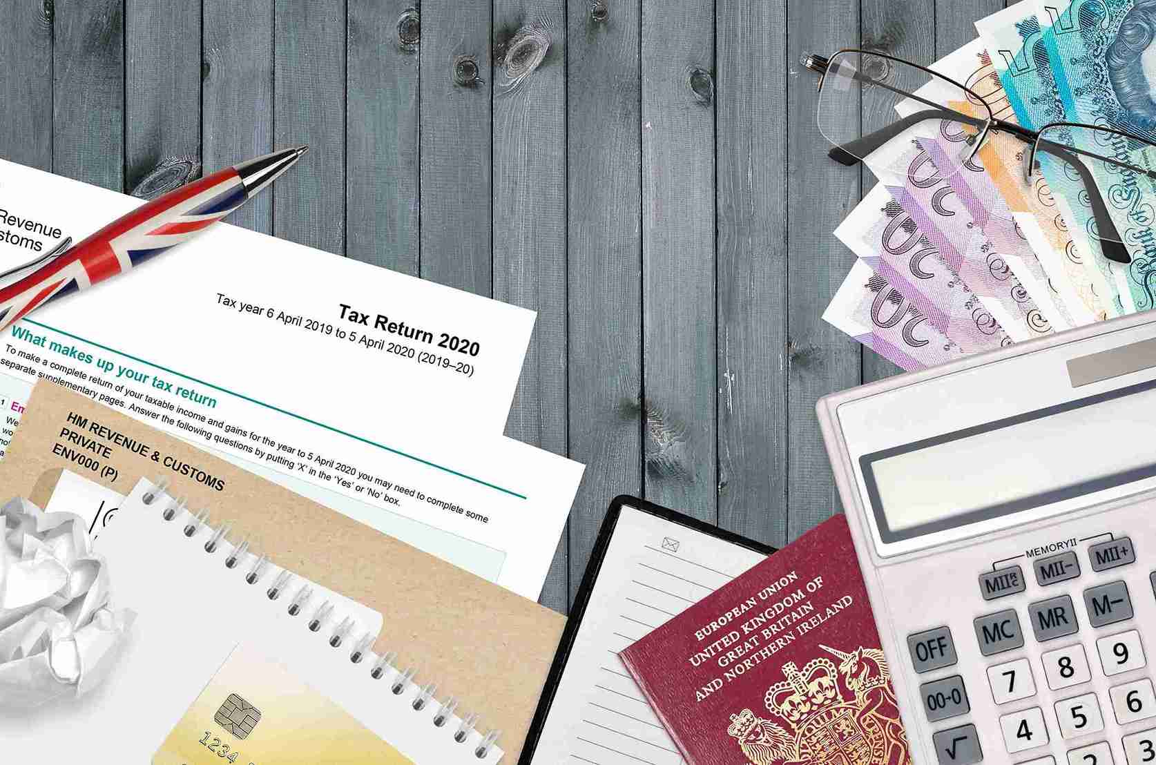 Flat lay of tax documents, British passport, calculator, and currency, representing Customs as a powerful UK investigative authority.
